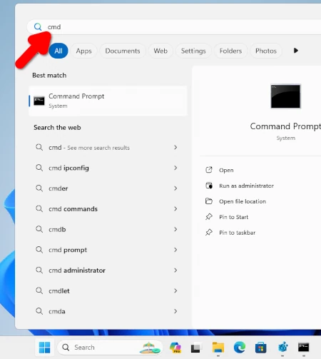 Typing cmd in Windows 11 Start menu search. Windows 11 Start menu search interface with cmd command entered. Windows 11 Start menu open with search box showing "cmd" typed in, with Command Prompt appearing as the top result.